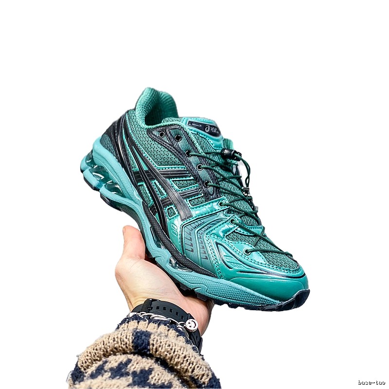 ASICS retro-style dark green sports shoes