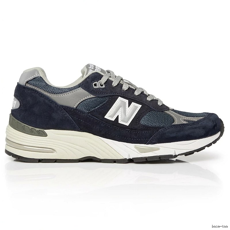 New Balance retro-style dark blue and grey sports shoes