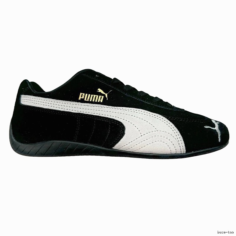PUMA classic black-and-white sports shoes